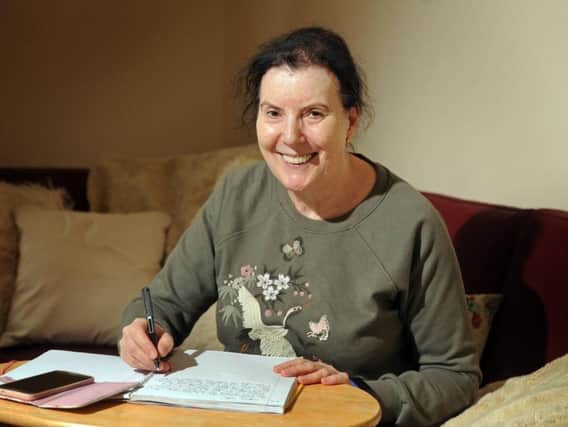 Janet Wallcraft, from Morley, who was suffering with loneliness before contacting the Silver Line, who have set her up with a telephone befriender and a penpal.  Picture Tony Johnson.