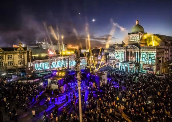 An installation titled We Are Hull by artist Zolst Balogh is projected onto buildings in the city's Queen Victoria Square, forming part of the Made in Hull series marking the official opening of Hull's tenure as UK City of Culture. PRESS ASSOCIATION Photo. Picture date: Sunday January 1, 2017. Made In Hull, curated by Sean McAllister, is a celebration of more than 70 years of the city's history told through massive projections on some of its best known buildings. See PA story ARTS Hull. Photo credit should read: Danny Lawson/PA Wire