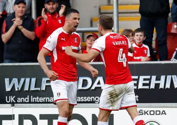 Rotherham United's Richard Wood (left) celebrates scoring his side's first goal of the game from a header during the Sky Bet League One Playoff match at the AESSEAL New York Stadium, Rotherham. (Picture: PA)