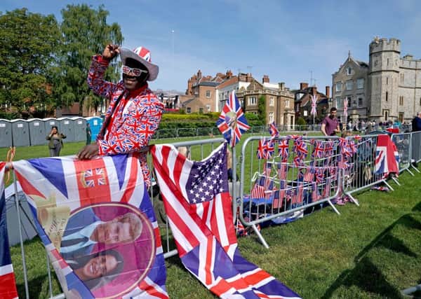 Royal fans in Windsor ahead of the wedding of Prince Harry and Meghan Markle. PIC: PA