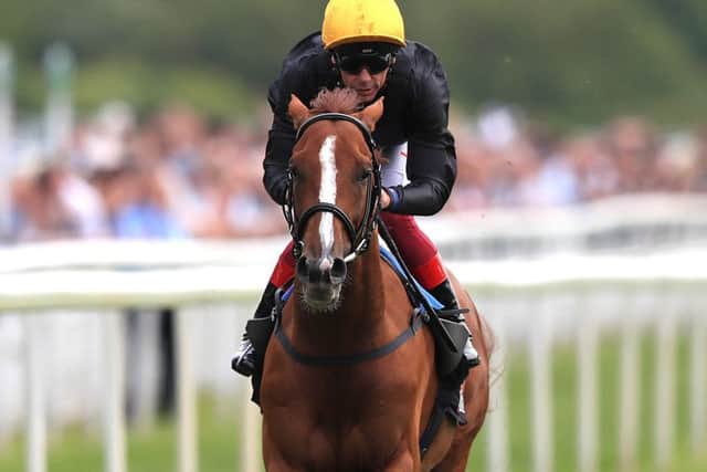 A motionless Frankie Dettori as Stradivarius strikes for home in the Yorkshire Cup.