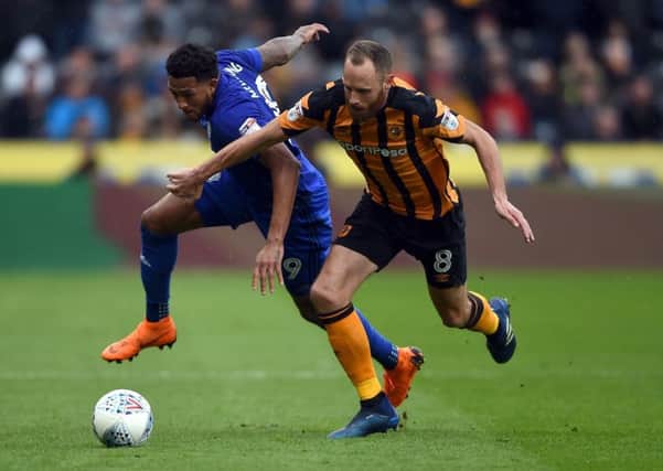 David Meyler, right, leaves Hull City having made 191 appearances for the club during a five-and-a-half year spell (Picture: Daniel Hambury/PA).