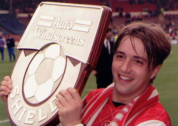 Wembley hero: Rotherham's Nigel Jemson celebrates.