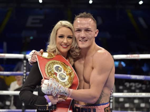 Warrington pictured with wife Natasha after his win. PIC: Steve Riding