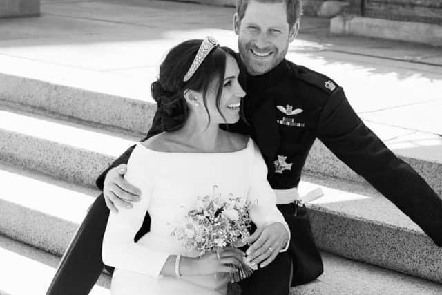 This official wedding photograph released by the Duke and Duchess of Sussex shows the Duke and Duchess pictured together on the East Terrace of Windsor Castle. Photo: Alexi Lubomirski/PA Wire