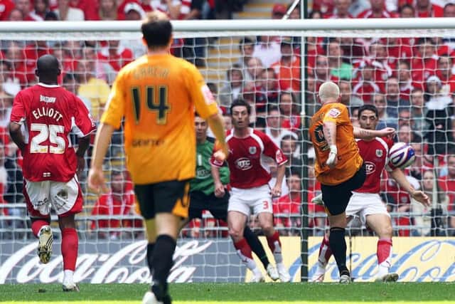 Magic moment: Hull City's Dean Windass volleys home the winning goal at Wembley.