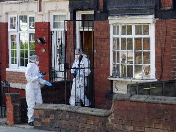Investigations continued today at the scene in Harehills