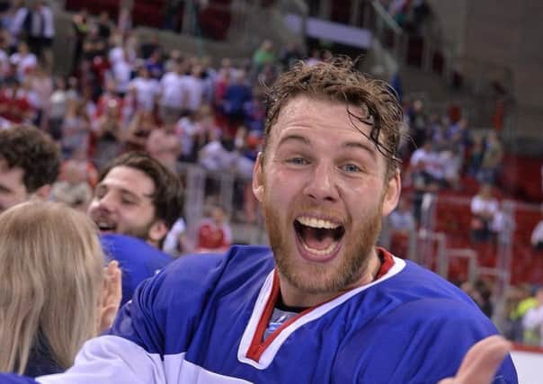Ben O'Connor - seen celebrating GB's gold medal triumph at the world championships - has sealed a move to the KHL with Barys Astana. Picture: Dean Wooley.