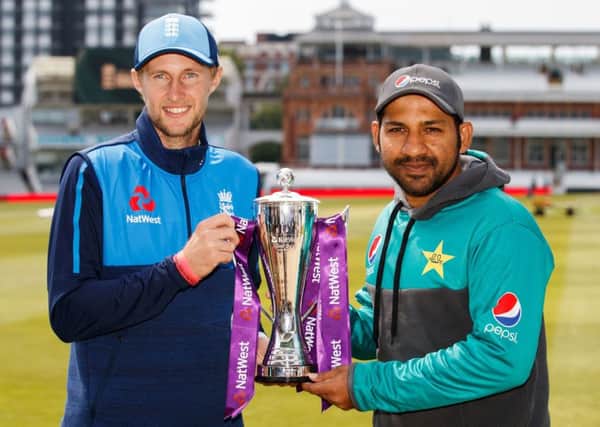 England's captain Joe Root, (left) and Pakistan captain Sarfraz Ahmed pose with the trophy at Lord's, London..
