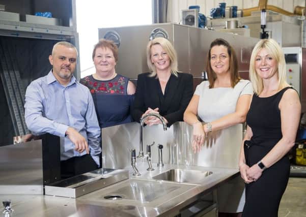 .
Pictured is Lindsey McMenamin of FW Capital (centre) with (l-r)  Mark White,  Lisa Featherstone, Sarah Clark and Debbie McNally, all members of the AFOS management team.
Picture: Sean Spencer/Hull News & Pictures Ltd
01482 210267/07976 433960
www.hullnews.co.uk         sean@hullnews.co.uk