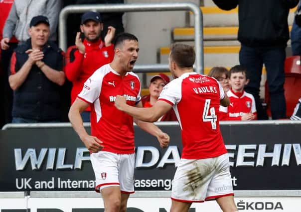Rotherham United's Richard Wood (left) celebrates in the play-offs.