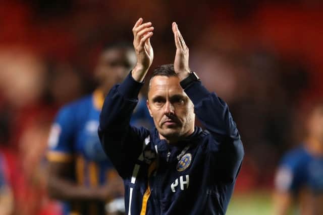Shrewsbury Town manager Paul Hurst applauds the fans after the final whistle. Picture: John Walton/PA