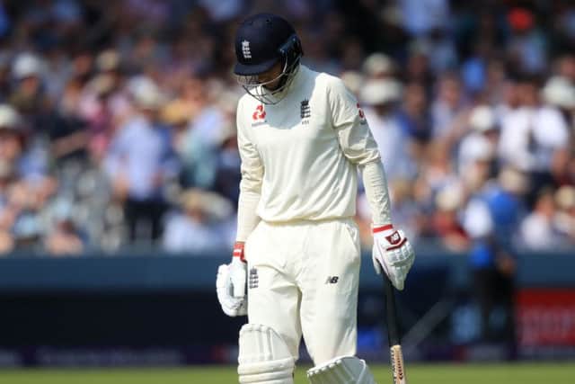 England's Joe Root walks off dejected after getting out on day three at Lord's. Picture: Adam Davy/PA