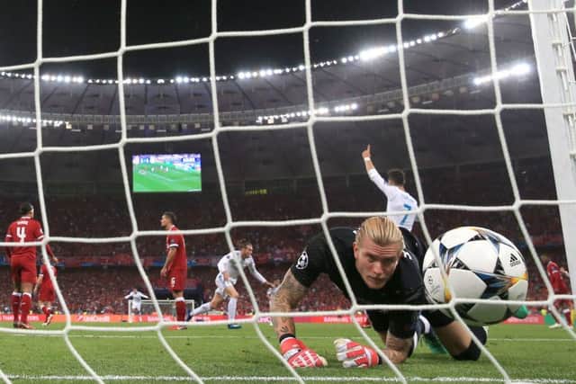 Oh no: Liverpool goalkeeper Loris Karius looks on as he fails to save Real Madrid's second goal from Gareth Bale. Pictures: Nick Potts/PA