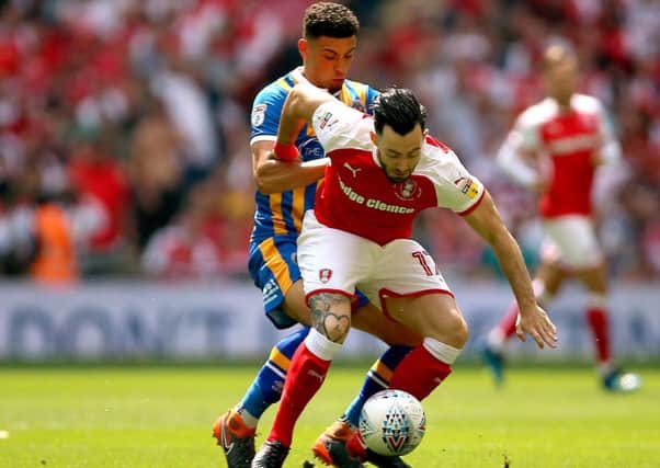 Rotherham United's Richard Towell (front) and Shrewsbury Town's Ben Godfrey (back) battle for the ball (Picture: Nigel French/PA Wire)