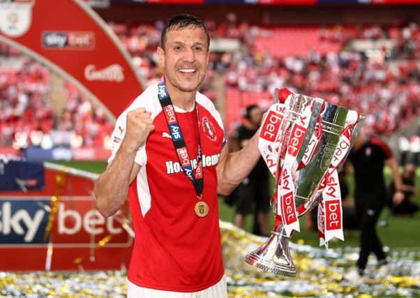 Rotherham United's Richard Wood celebrates with the trophy after the Sky Bet League One play-off final at Wembley Stadium, London. (Picture: John Walton/PA Wire)