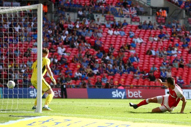 Richard Wood steers home his second and the winning goal for Rotherham (Picture: Getty Images)
