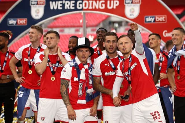 Rotherham United celebrate after the Sky Bet League One Final at Wembley Stadium, London.