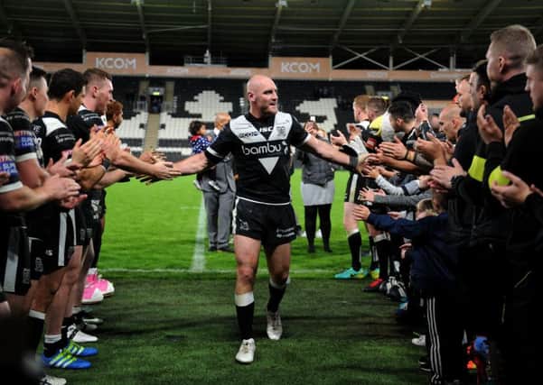 CHEERS: Gareth Ellis receives a gaurd of honour after his last home match for Hull FC last year. Picture: Jonathan Gawthorpe