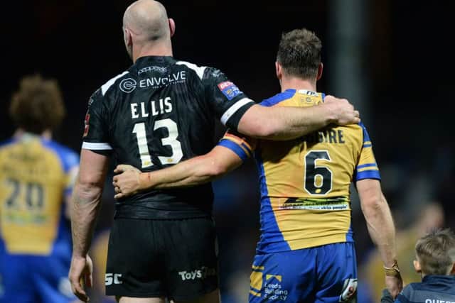 Gareth Ellis and Danny McGuire leave the Headingley pitch after last year's play-off semi-final, Ellis's final game as a player.  Picture: Bruce Rollinson.