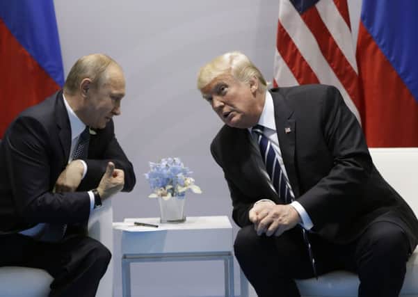 Vladimir Putin and Donald Trump meeting at the G20.