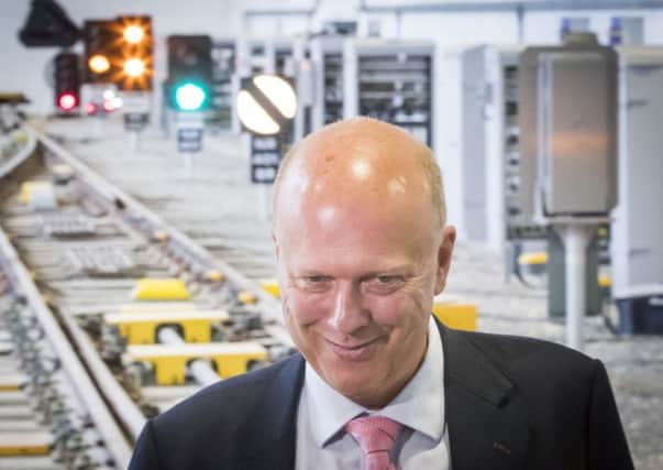 Is Network Rail or Transport Secretary Chris Grayling to blame for the chaos on the railways?