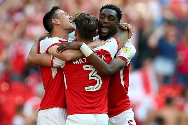 Rotherham United's Richard Wood (left) celebrates with team-mates Rotherham United's Semi Ajayi (right) and Rotherham United's Joe Mattock (centre) after the final whistle during the Sky Bet League One Final at Wembley (Picture: Nigel French/PA Wire)