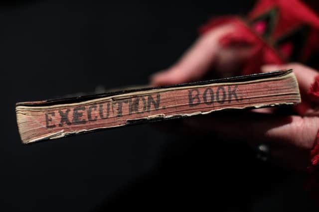 An execution notebook from a collection of crime memorabilia linked Albert Pierrepoint during a press preview at Summers Place Auctions. Picture: Jack Taylor/Getty Images