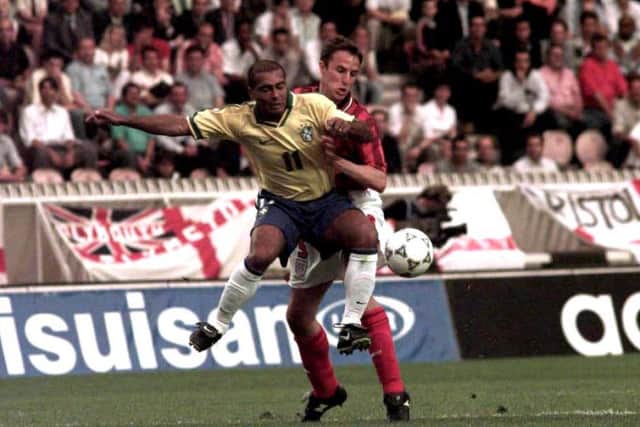 England's Gareth Southgate (right) gives a lift to Brazilian Ronario during the Tournoi de France in Paris back in 1997. Picture: Sean Dempsey/PA.