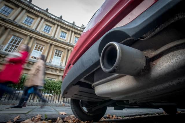 From April, drivers in Bath (pictured) and Birmingham will have to pay up to £8 per day to use their vehicle in the city centre (Photo by Matt Cardy/Getty Images)
